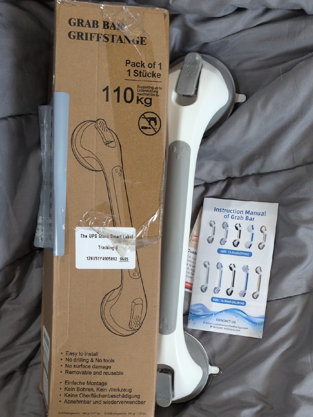 White and Gray Suction Grab Bar